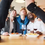 Friends in the restaurant at a striptease dinner